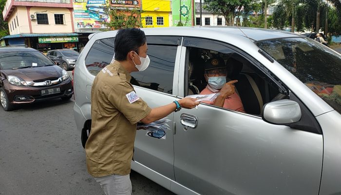 HPN 2021, PWI dan SMSI Bagi-Bagi Masker